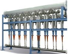 Zdjęcie piasecznika. Urządzenie składa się ze stożków zwężających się ku dołowi, osadzonych na metalowej konstrukcji.