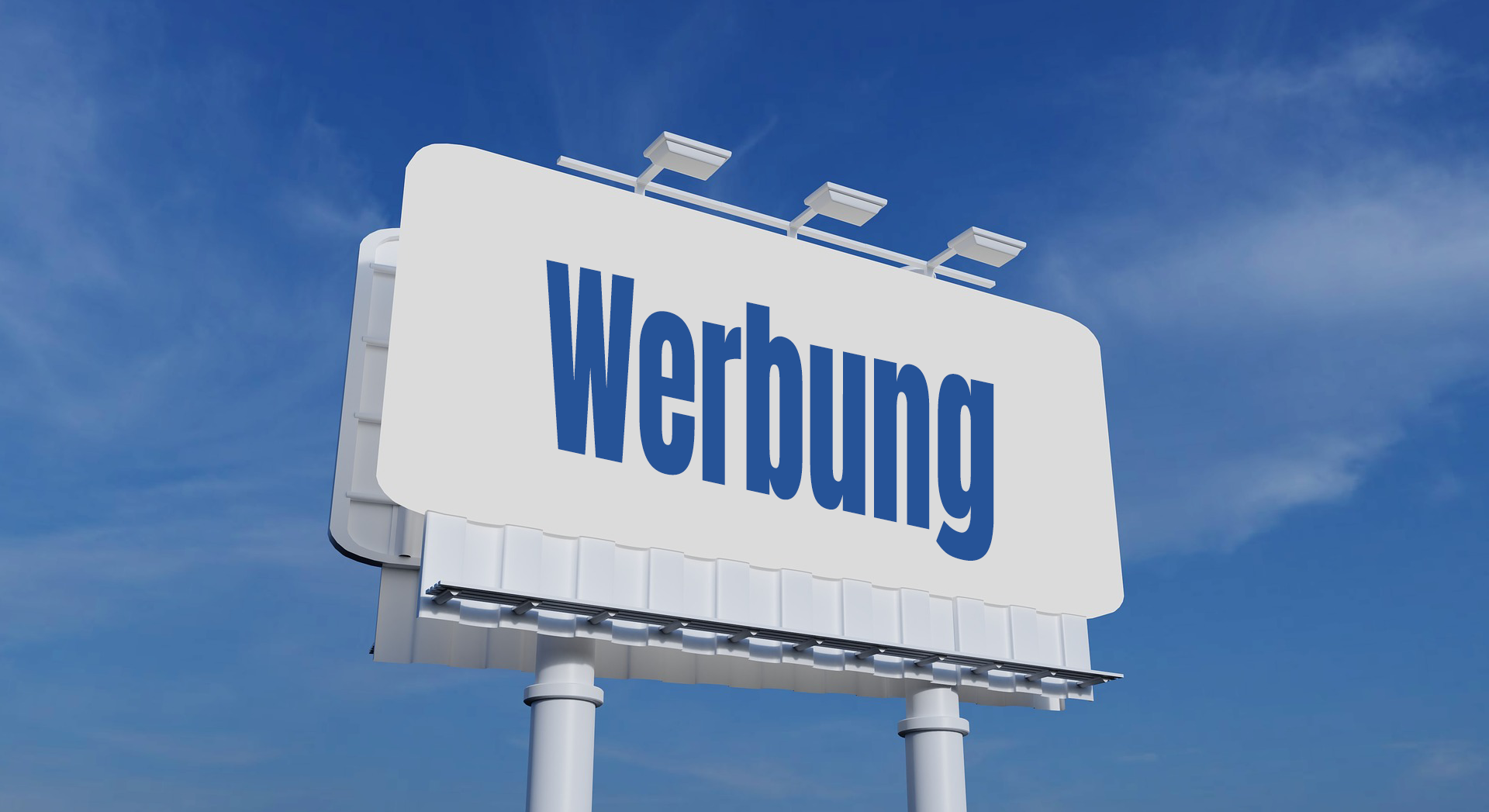Ilustracja przedstawia biały billboard na tle niebieskiego nieba wsparty na dwóch słupach. Na billboardzie widoczny jest duży niebieski napis. Werbung.