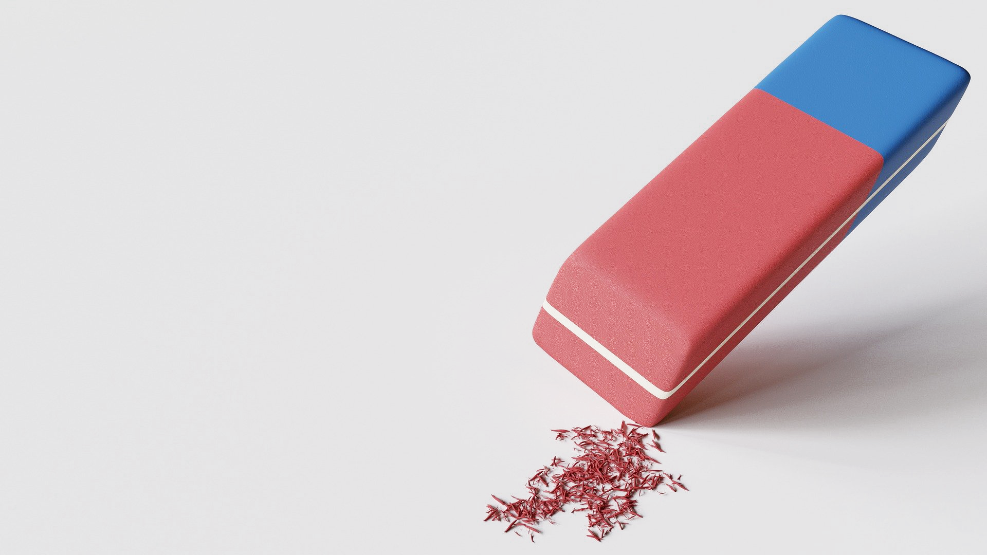 Zdjęcie przedstawia dwukolorową gumkę do ścierania.