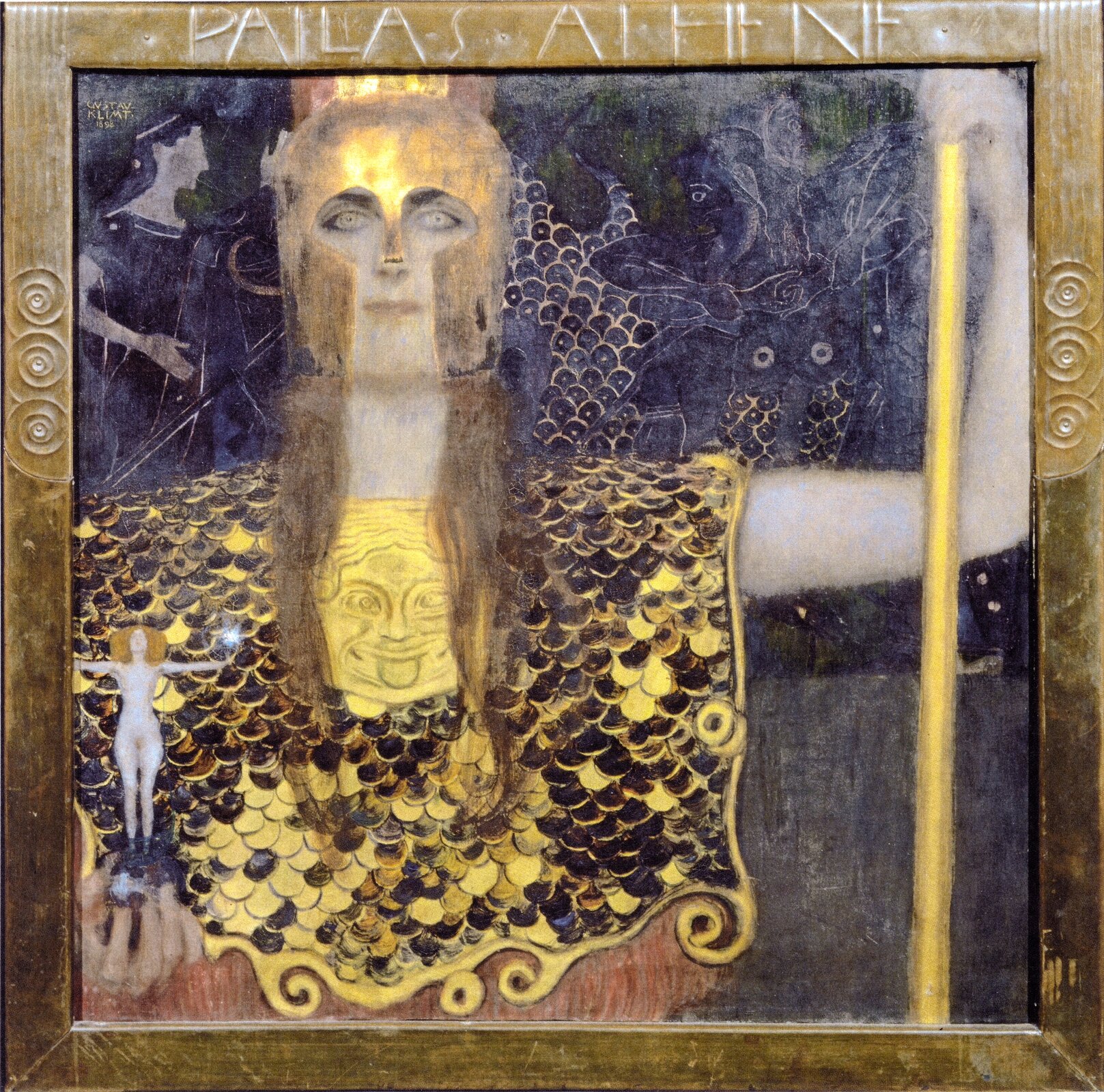 Na ilustracji przedstawiono obraz Gustawa Klimta zatytułowany „Minerwa lub Pallas Atena”. W centrum widnieje postać Ateny. Ubrana jest w złoty hełm i złotą zbroję. W jednej ręce trzyma drzewce, natomiast w drugiej statuetkę kobiety z szeroko rozłożonymi ramionami. Na ramieniu bogini siedzi sowa. Na obrazie, nad głową Ateny, znajduje się podpis PALLAS ATHENE.