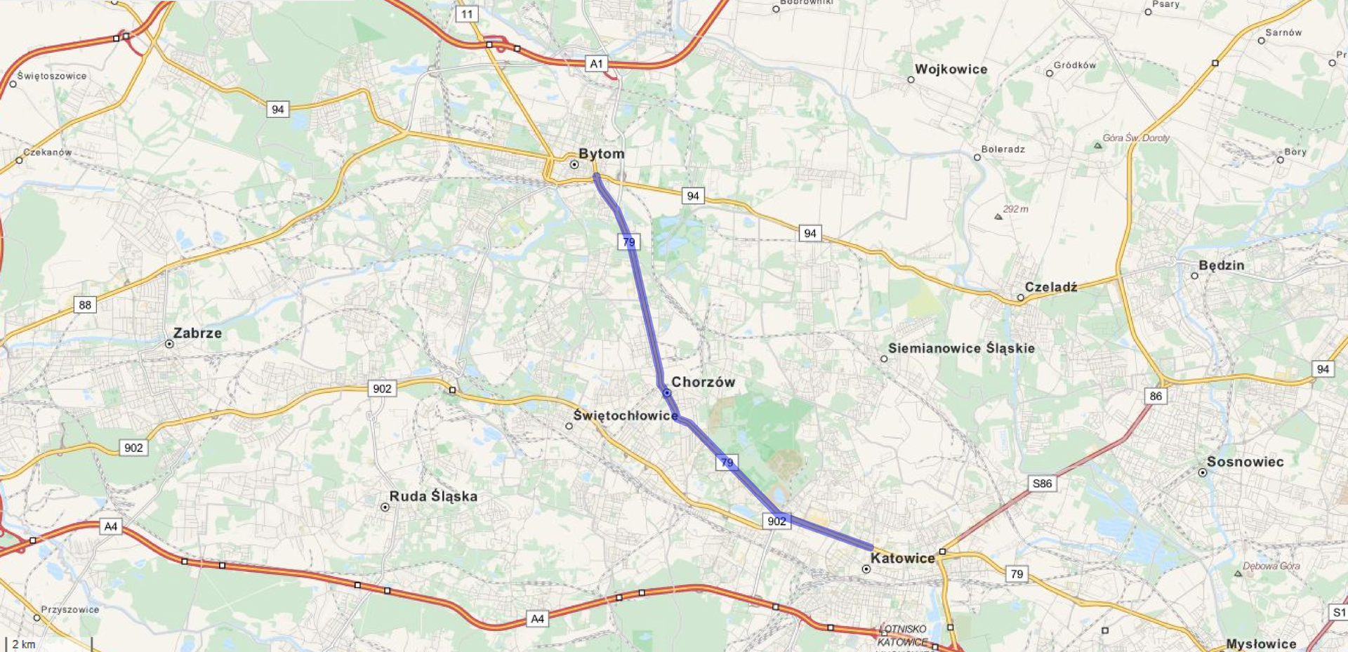 Ilustracja przedstawia fragment mapy Górnego Śląska. Na mapie zaznaczono niebieskim kolorem fragment drogi nr 79, na odcinku między Bytomiem a Katowicami. Droga ta wiedzie przez Chorzów. Katowice są na południowy wschód od Bytomia.