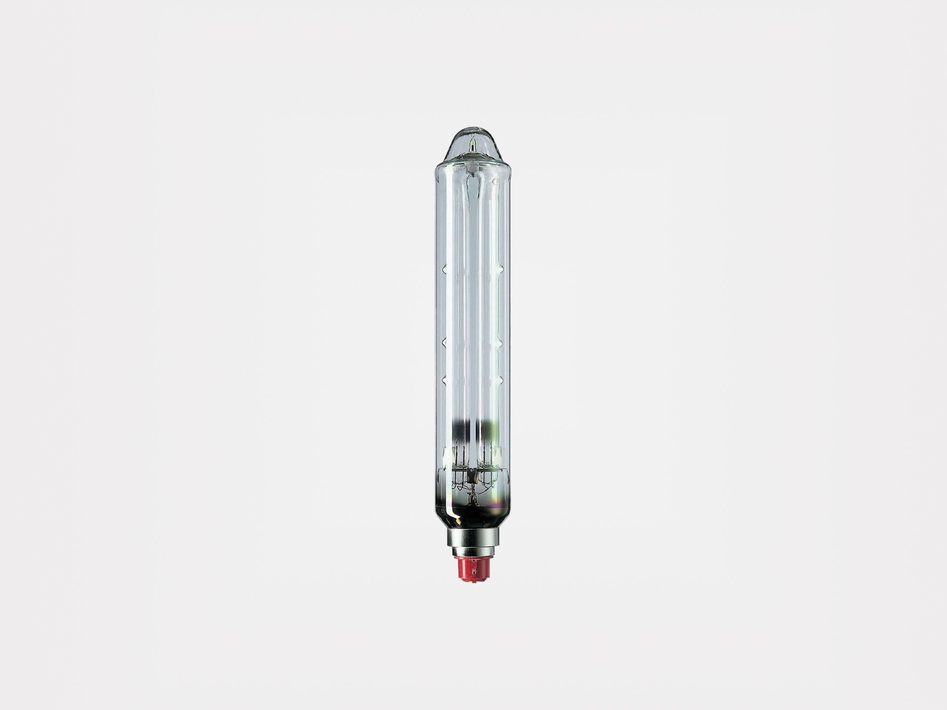 Ilustracja przedstawia podłużną żarówkę zaokrągloną na końcówce.