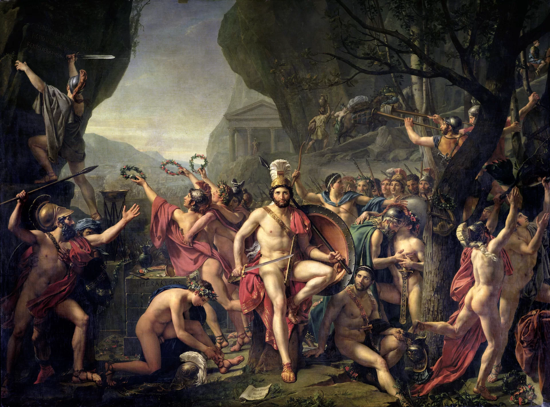 Dzieło autorstwa Jacquesa‑Louisa Davida pod tytułem „Leonidas pod Termopilami”. W centrum obrazu namalowany został Leonidas, przedstawiony jako nagi mężczyzna w średnim wieku, o średniej długości ciemnych włosach i ciemnym zaroście. Na jego głowie znajduje się hełm z białym pióropuszem. Widać szatę przerzuconą przez jego ramię, która przykrywa jego plecy i sięga mu do łydek, odkrywając przód jego sylwetki. W jednej dłoni trzyma włócznię i tarczę, a w drugiej miecz. Wokół Leonidasa zgromadzili się jego żołnierze, którzy przygotowują się do walki. Z prawej strony rośnie drzewo o ciemnej korze oraz drobnych zielonych listkach na gałęziach. Na drugim planie widać skały, a w tle góry, grecką świątynię i szarobłękitne niebo.