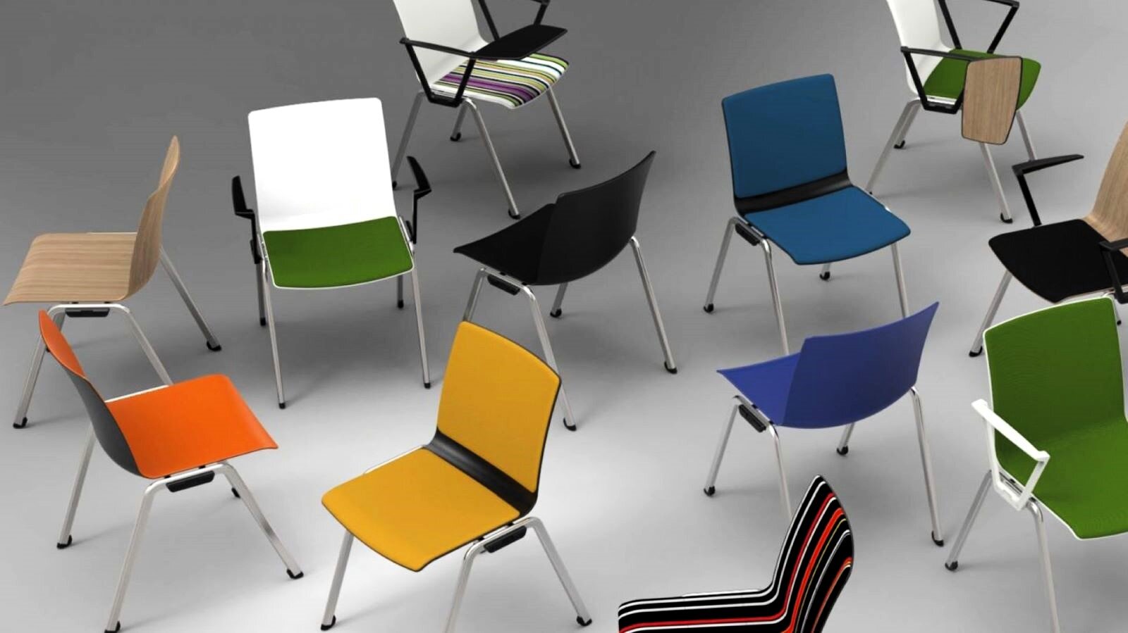 Zdjęcie zrobione z góry przedstawia nowoczesne, proste krzesła rozstawione obok siebie. Krzesła różnią się nieznacznie kształtem, a kolory ich są ciepłe, zimne oraz w paski.