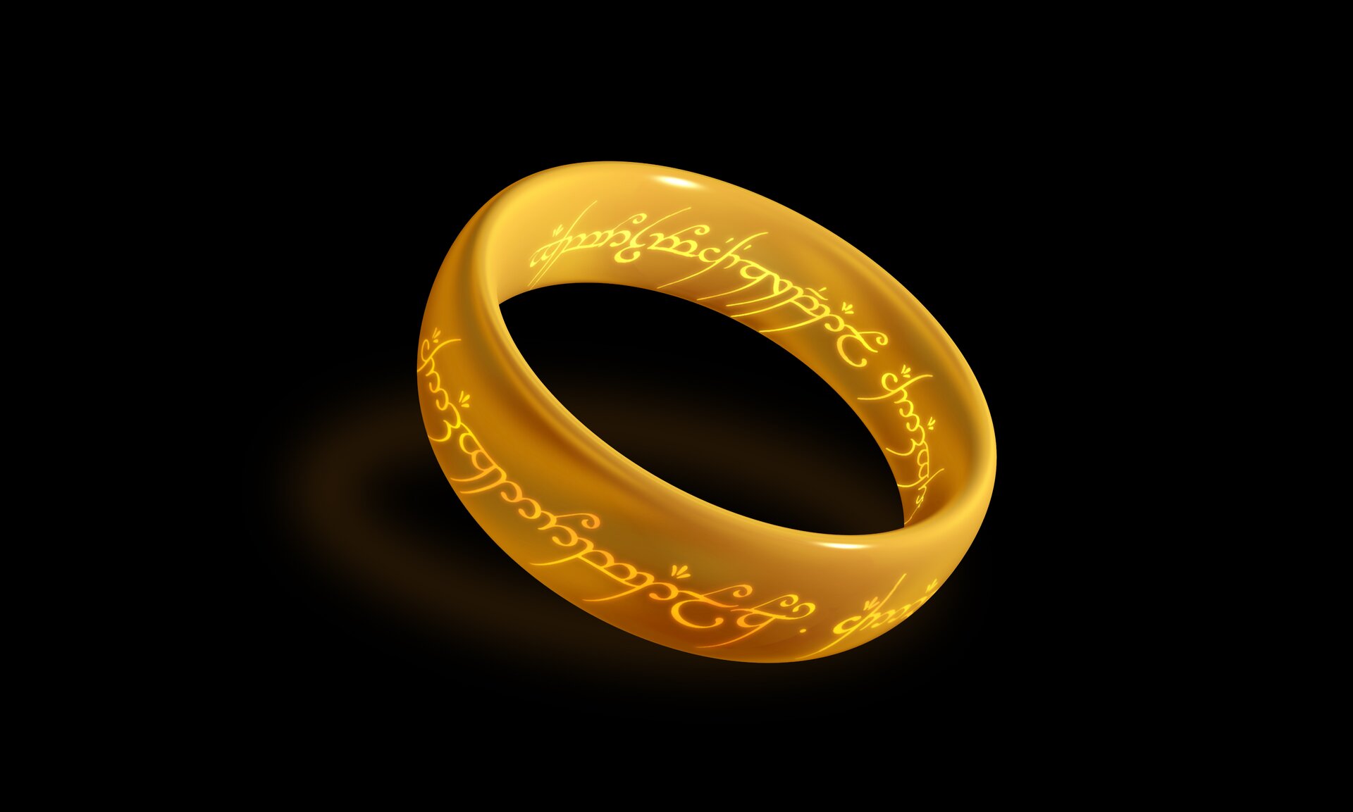 Ilustracja przedstawia złoty okrągły pierścień z wygrawerowanym tekstem w niezrozumiałym języku po wewnętrznej i zewnętrznej stronie. Tło jest czarne.
