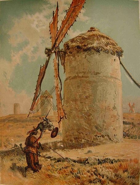  Na ilustracji został przedstawiony Don Kichot w zbroi rycerskiej, który spada z konia upadającego na ziemię. Don Kichot opada naprzeciwko wiatraka ze słomianym dachem i czterema skrzydłami, który stoi pośród łanów zbóż. W dali na polu są widoczne inne wiatraki. 