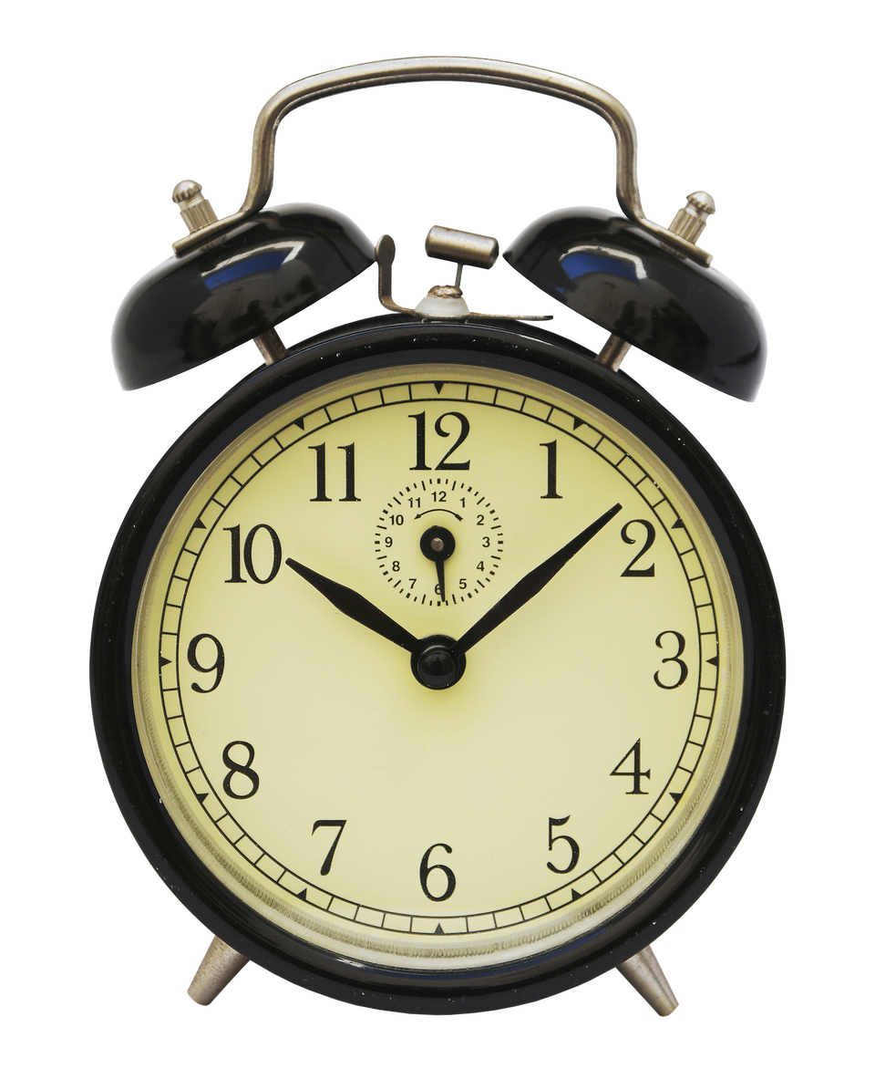 Zdjęcie przedstawia  zegarek ze wskazówkami i tarczą typu budzik, z dzwonkami na górze.