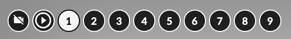 Grafika przedstawia pasek z okrągłymi ikonami. Pierwsza przedstawia przekreśloną kamerę, druga przycisk play, czyli trójkąt wpisany w okrąg, a kolejne to cyfry od jeden do dziewięć.