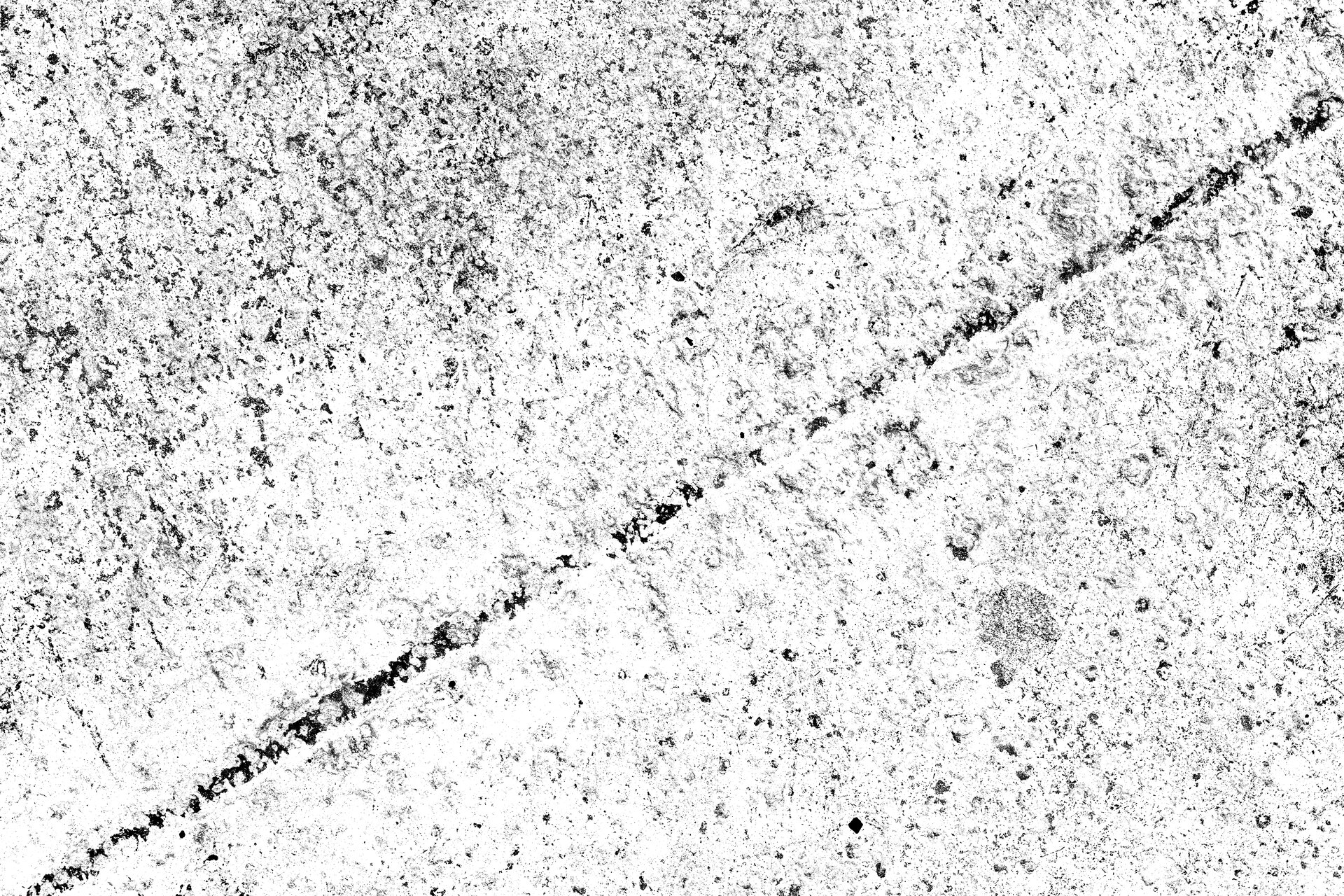 Zdjęcie przedstawia rysę w tynku wapiennym. Jest ona  długa i prosta.