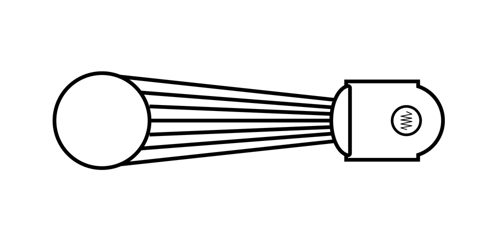 Ilustracja przedstawia przykład oświetlenia. Z dużego reflektora rozchodzi się światło wąskim promieniem oświetlając znajdujący się przed nim nieduży przedmiot całkowicie, ale tylko od frontu.
