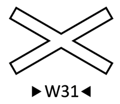 Wskaźnik wu trzydzieści jeden. Biały ukośny krzyż z czarną obwódką.