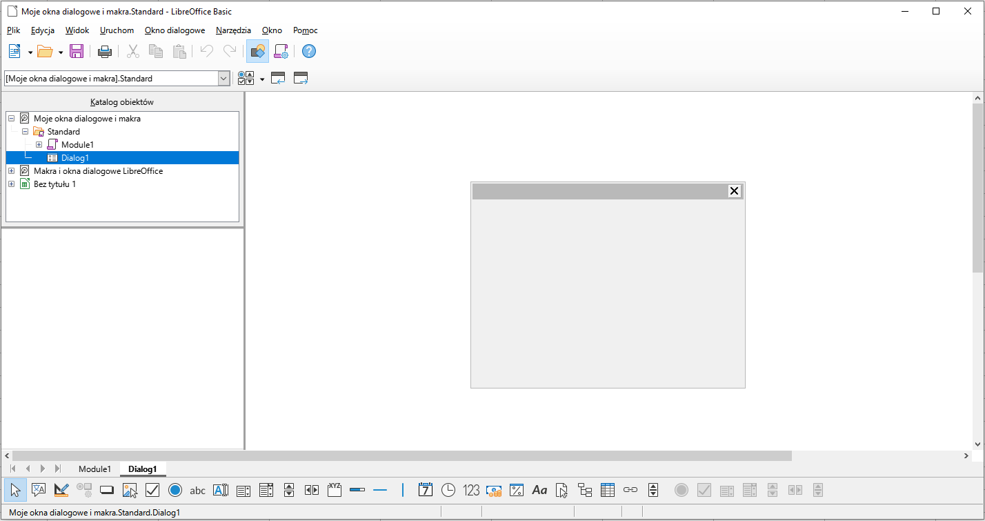 Ilustracja przedstawia okno o nazwie: Moje okna dialogowe i makra. Standard - LibreOffice Basic. Z Katalogu obiektów wybrano Dialog1. Na dole okna pojawia się zakładka Dialog1. Po prawej stronie jest szary prostokąt z krzyżykiem w górnym prawym rogu. 