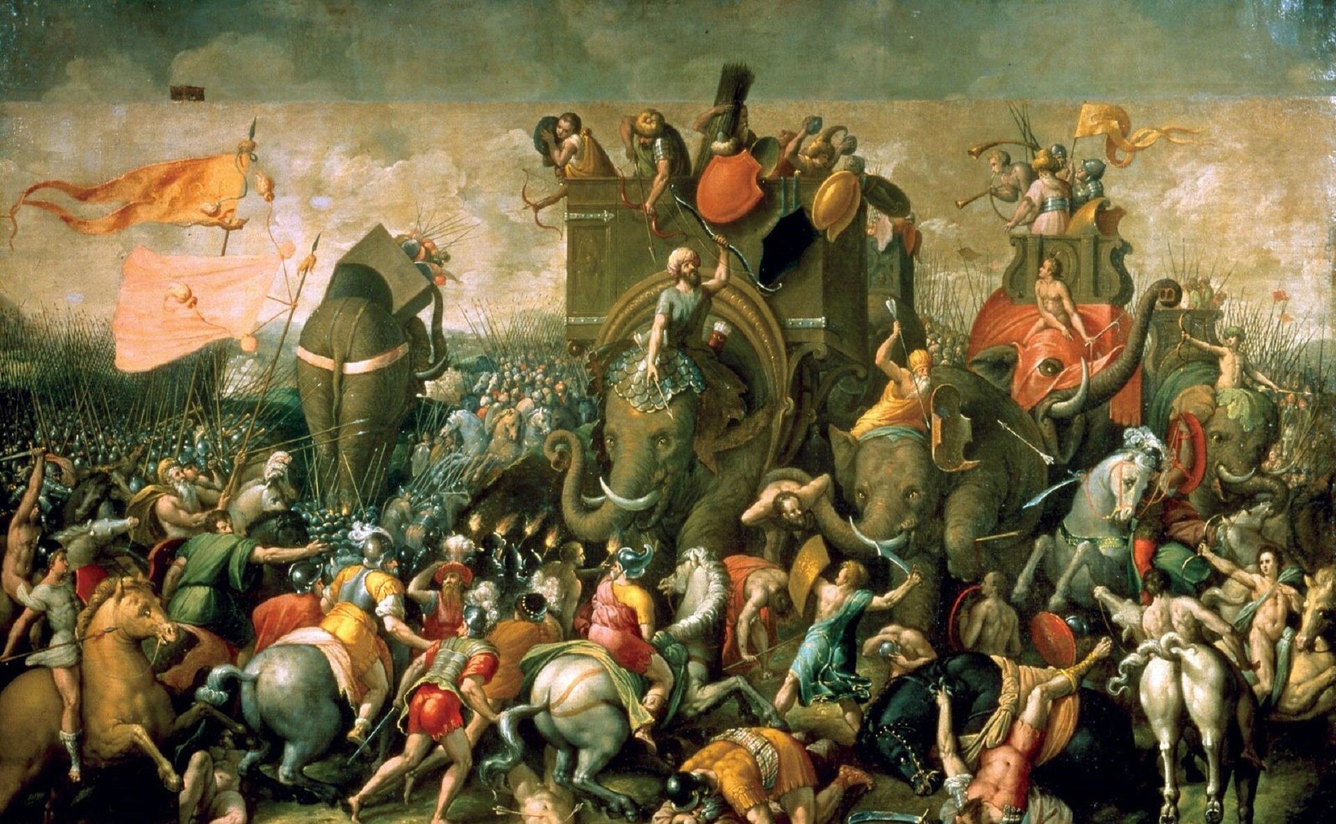 Kolorowa ilustracja przedstawia dzieło Cornelisa Corta pt. „Bitwa pod Zamą”. Jest to scena starcia wojsk rzymskich z punickimi. W centralnej części obrazu znajdują się wojownicy jadący na słoniach. Dwa słonie ukazane są z przodu, jeden, na drugim planie, tyłem. Na pierwszym planie walczy konnica. Na ziemi leżą martwi i ranni żołnierze. Nad walczącymi powiewają chorągwie. Dodatkowe informacje: 1: Po śmierci ojca służył w wojsku pod rozkazami swego szwagra Hasdrubala, a gdy tego zamordowano w roku 221 p.n.e., został naczelnym wodzem armii kartagińskiej i natychmiast rozpoczął przygotowania do nowej wojny z Rzymem (II wojny punickiej). 2. Na czarnobiałej ilustracji ukazano słonie atakujące żołnierzy rzymskich. Ze słoni strzelają z kusz Kartagińczycy.