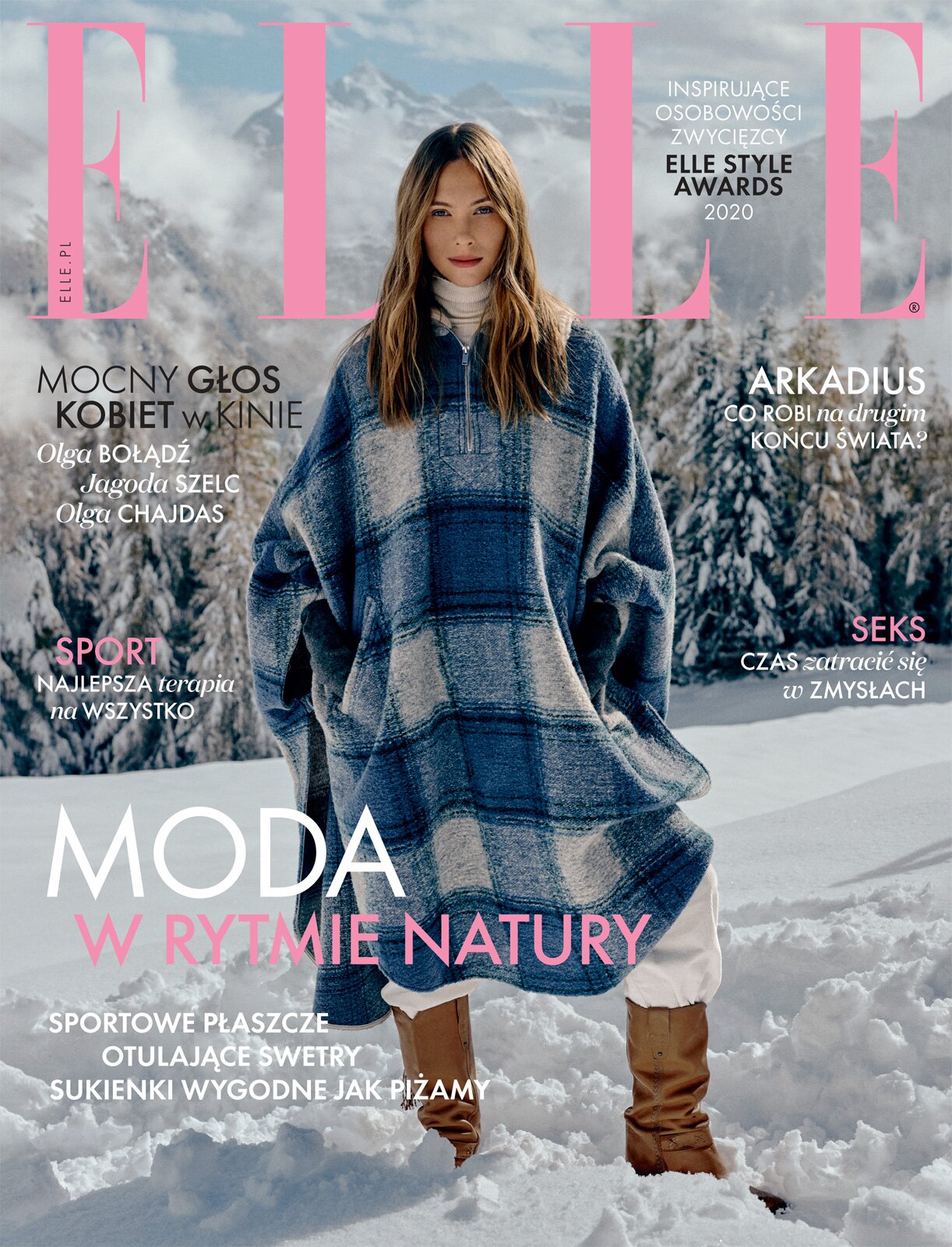 Okładka przedstawia fotografię kobiety na tle zimowego pejzażu składającego się z gór, drzew oraz grubej warstwy śniegu. Kobieta stoi na podłożu pokrytym czystym, białym śniegiem sięgającym jej do kostek. Ma na sobie brązowe buty z wysokimi cholewkami, białe spodnie oraz obszerny płaszcz, przypominający grube ponczo w kratę, w wielu odcieniach niebieskiego. Zamek pod szyją kobiety jest rozpięty, ukazując kawałek białego golfu. Jej jasnobrązowe włosy, z przedziałkiem pośrodku, opadają na płaszcz, a niebieskie oczy skierowane są w stronę obiektywu. Tło stanowią góry oraz drzewa pokryte śniegiem.