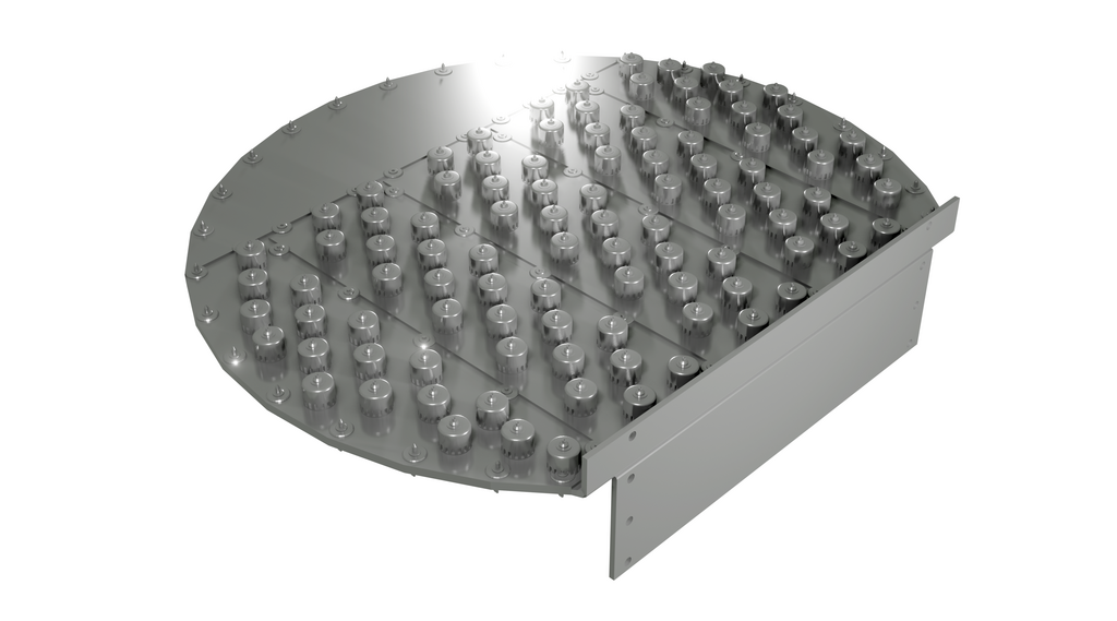 Na zdjęciu przedstawiono półkę z kołpakami.Widoczna półka jest okrągła. Środek okręgu stanowi blacha. Na blasze znajdują się równomiernie rozmieszczone cylindryczne wypustki. Wypustki mają niewielką wysokość. Na górnej podstawie każdego z cylindrów umieszczona jest niewielka kula.