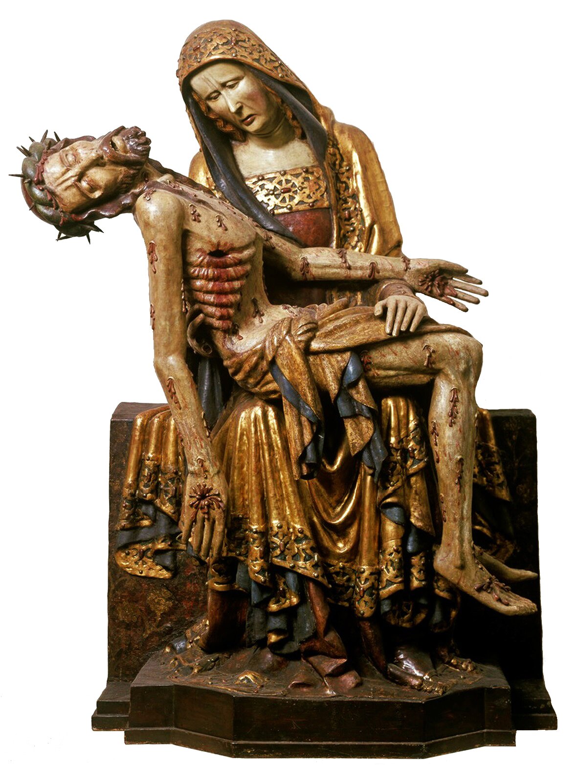 Rzeźba wykonana jest z drewna lipowego. Pokryta jest polichromią. Przedstawia Matkę Bożą w pozycji siedzącej. Jest ona ubrana w złotą długą suknię z czarnym dodatkiem ozdobioną ornamentyką. Góra sukni ma kolor czerwony. Na głowie ma złoty welon z czarną tkaniną. Trzyma ona ciało Chrystusa zdjęte z krzyża. Maryja jest zrozpaczona. Spogląda na martwe ciało Syna, które spoczywa na jej kolanach. Na biodrach jest zawieszona złota przepaska. Głowa Chrystusa jest odchylona w prawo. Jego ręka leży na ręce Matki Bożej. Druga ręka opada w dół. Ciało Chrystusa jest wychudłe i poranione. Z ran wypływała  krew, która zastygła w formie skrzepów. Na głowie ma cierniową koronę.