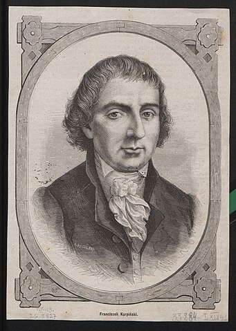 Obraz przedstawia portret mężczyzny w średnim wieku. Ma on lekko falujące, zaczesane na twarz włosy. Jego twarz jest owalna. Ma wyraziste brwi i duże oczy. Jego nos jest prosty. Mężczyzna ma koszulę ze stójką. Pod szyją ma zawiązany fontaź. Nosi surdut.