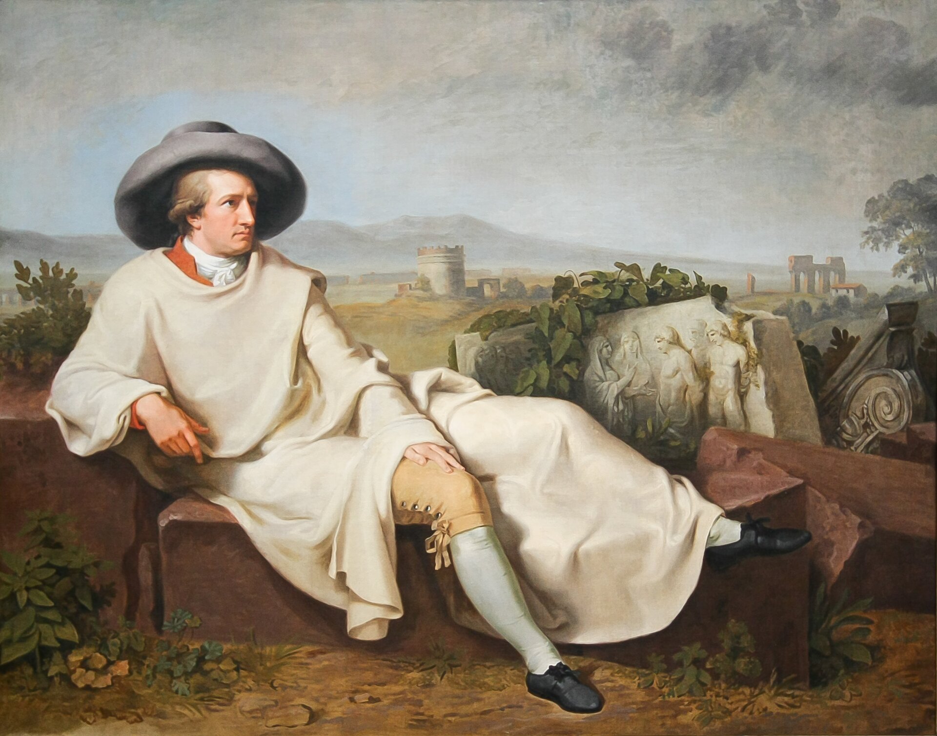 Goethe w Kampanii Źródło: Johann Heinrich Wilhelm Tischbein, Goethe w Kampanii, 1787, olej na płótnie, Städelsches Kunstinstitut und Städtische Galerie, domena publiczna.