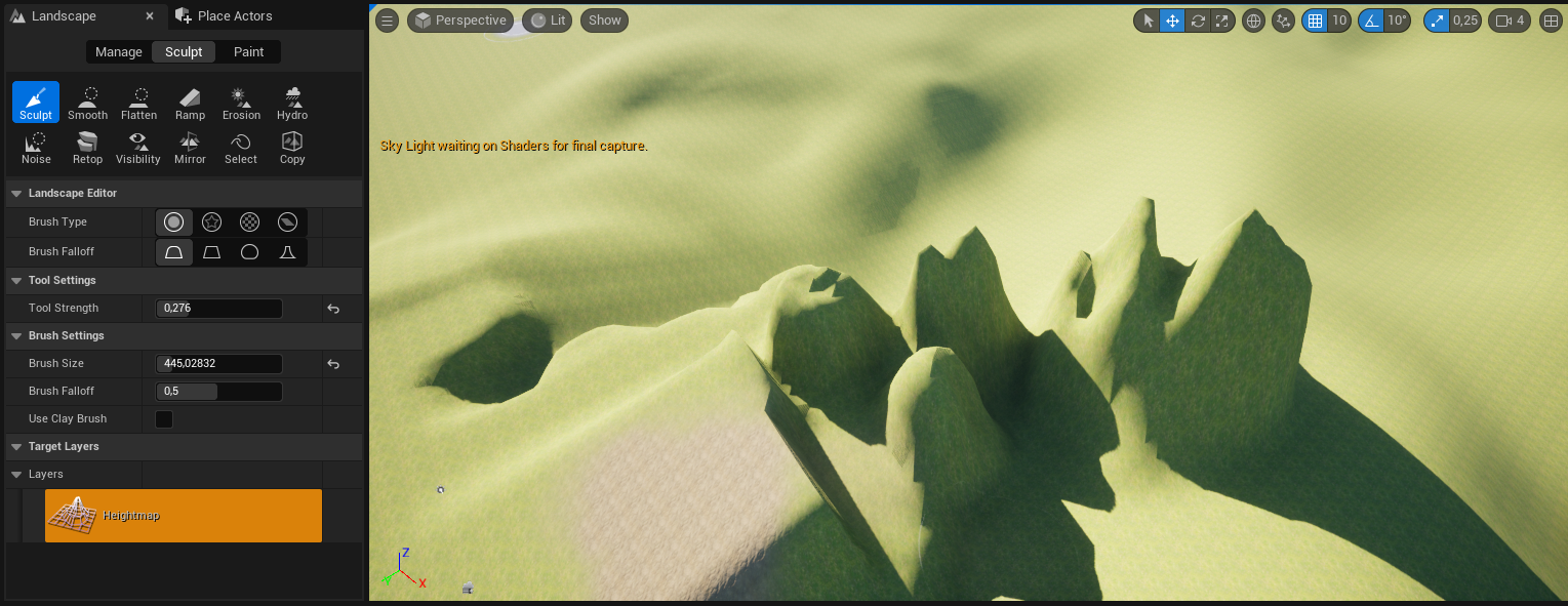 Ilustracja przedstawia zrzut ekranu - panel programu  Unreal Engine . Widoczny jest ekran z rozległą płaszczyzną w kolorze zielono - beżowym. Po prawej stronie znajduje się płaska powierzchnia, a w lewym dolnym rogu ekranu rampa przypominająca odwróconą figurę przestrzenną z dwoma bokami w kształcie trójkątów prostokątnych. Przed nim widoczna jest sekwencja wyżyn pełniących rolę platform. Niżej położona płaszczyzna jest pofalowana. W lewym górnym rogu widać napis:  Sky Light waiting on Shaders for final capture . Na górze ilustracji znajdują się ułożone w rzędzie symbole graficzne, a lewej strony lista menu z dwoma zakładkami:  Landscape  i  Place Actors , trzy opcje z wybraną opcją środkową:  Manage, Sculpt, Paint , a pod spodem dwa szeregi ikonek z podpisami. Wybrana jest pierwsza ikonka w górnym rzędzie z symbolem dłuta i podpisem  Sculpt . Poniżej, w kolejnych linijkach znajdują się grupy opcji menu: pierwsza z nich to  Landscape Editor  z opcjami:  Brush Type:  - wybrana jest tu ikonka koła obwiedzionego okręgiem większej średnicy oraz  Brush Falloff  z wybraną ikonką przypominającą trapez z zaokrąglonymi górnymi rogami; druga z nich to:  Tool Settings  z opcją:  Tool Strength:  i wpisaną wartością 0,276; trzecia grupa opcji menu to:  Brush Settings  z opcją:  Brush Size  i wpisaną wartością 445,02832,  Brush Falloff  i wpisaną wartością 0,5 i odznaczoną opcją:  Use Clay Brush ; czwarta grupa opcji menu to:  Target Layers , a piąta  Layers  z pomarańczowym przyciskiem z ikonką siatki terenu z widocznym wybrzuszeniem oraz napisem:  Heightmap .
