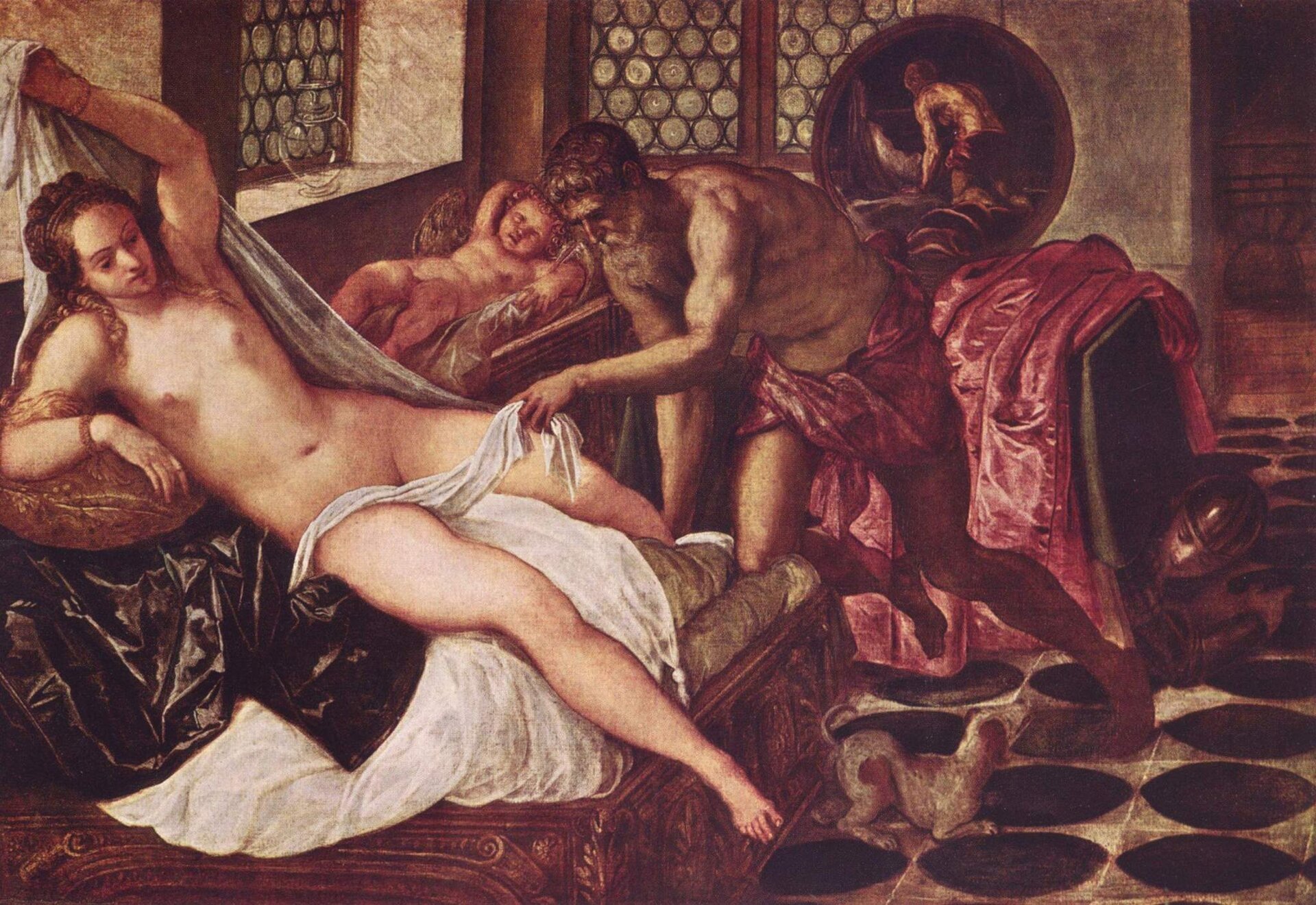 Ilustracja przedstawia obraz Jacopo Tintoretto pod tytułem „Wulkan zaskakuje Wenus i Marsa”. Dzieło prezentuje mężczyznę, który przygląda się kobiecie i okrywa ją białą szatą. Kobieta jest naga, mężczyzna ma bordową szatę przepasaną w pasie. Za nimi znajduje się kołyska z dzieckiem.
