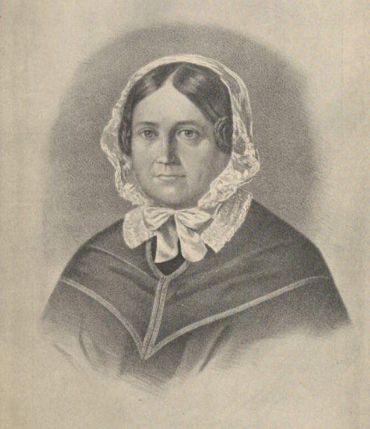 Ilustracja przedstawia kobietę w średnim wieku, ubraną w biały, haftowany czepiec wiązany pod szyją na kokardkę. Włosy z przedziałkiem na środku, utrefione nad uszami, schowane pod chustą. Na ramionach płaszcz z lamówką.