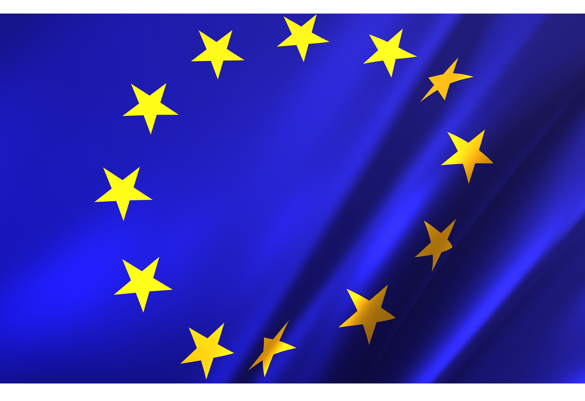 Na zdjęciu przed znajduje się flaga Unii Europejskiej – dwanaście ułożonych w okrąg żółtych, pięcioramiennych gwiazd umieszczonych na niebieskim tle. 