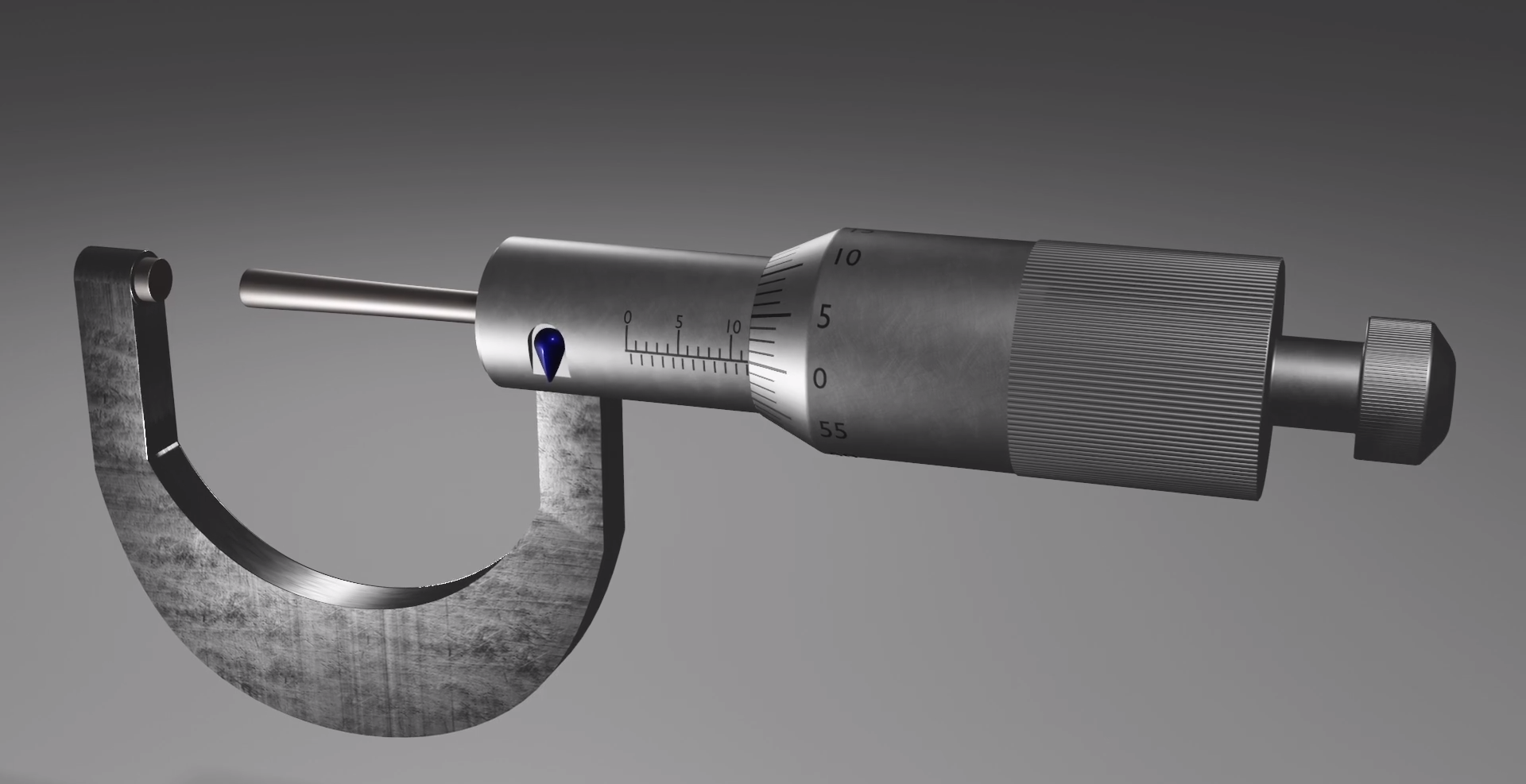 Ilustracja przedstawia mikrometr. Na jego rączce znajduje się podziałka, która pokazuje jak daleko oddalone są od siebie szczęki mikrometru.