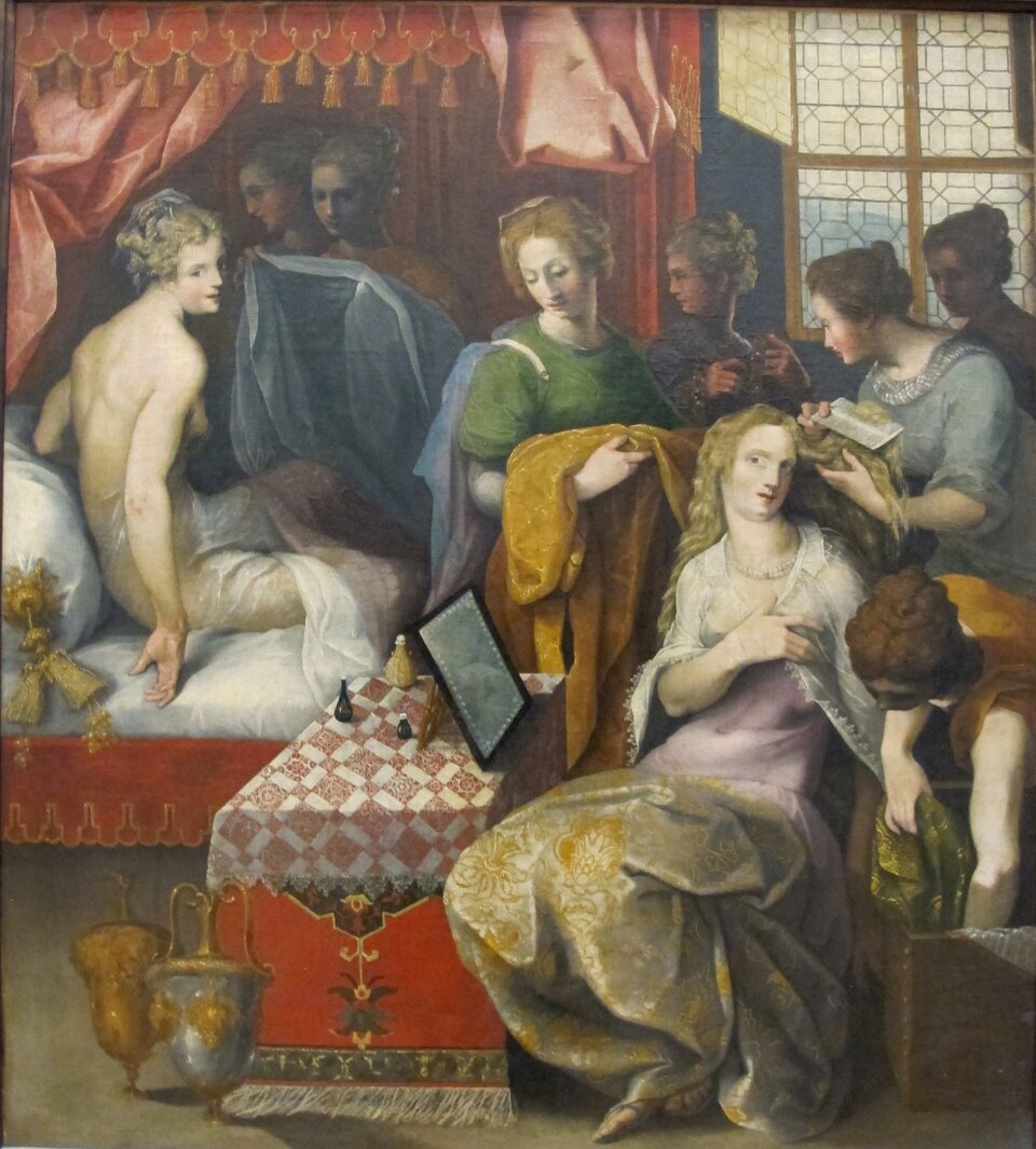 Ilustracja o kształcie pionowego prostokąta przedstawia obraz Toussainta Dubreuila „Hyante i Climene w swojej toalecie”. Ukazuje pomieszczenie, w którym znajduje się grupa osób. Po lewej stronie przedstawiona jest wstająca z łoża z czerwonym baldachimem, naga kobieta. Towarzyszą jej inne postacie, które pomagają jej przy toalecie. Te same czynności wykonują postacie po prawej, usługując siedzącej przed lustrem, stojącym na stoliku, przy którym stoją dwa dzbany. Po prawej stronie pomieszczenia znajduje się duże okno. 