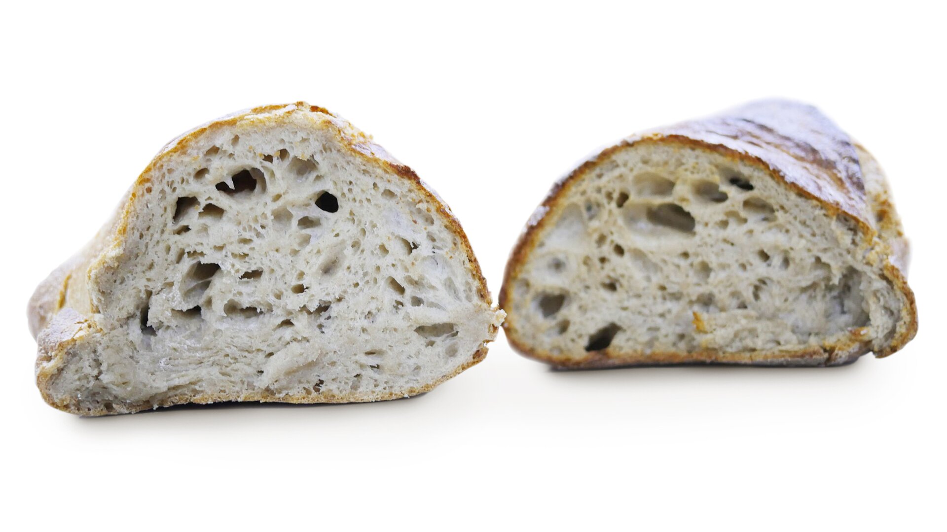 Zbliżenie przekroju kęsa ciasta mieszanego pokazujące strukturę w fazie wypieku z wadą przepieczenia