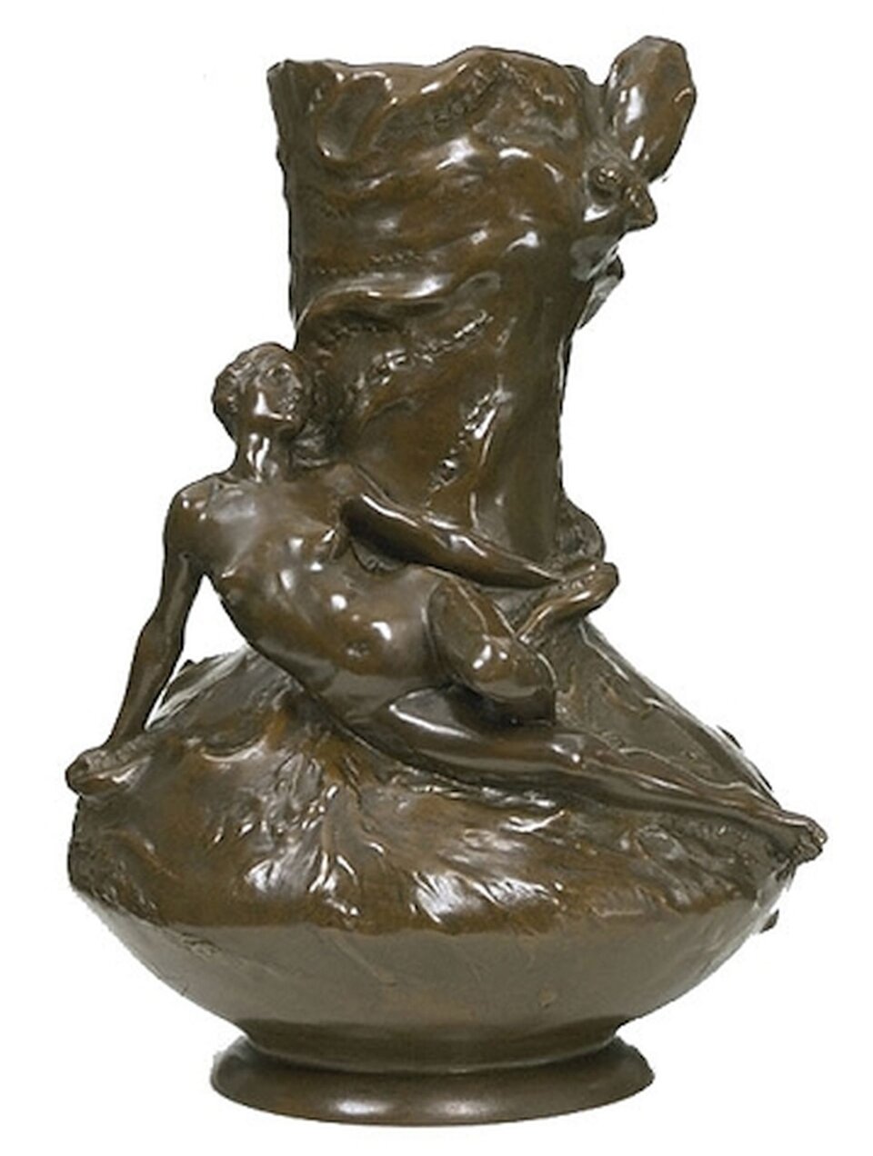 Ilustracja przedstawia wazon secesyjny. Pochodzi z 1895 roku. Zdobienie stanowi naga postać kobiety na wazonie. Przedmiot jest koloru brązowego.Dół wazonu jest pękaty i zwęża się ku górze.