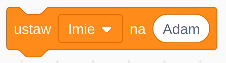 Na obrazie widoczny jest graficzny blok programistyczny, typowy dla środowisk programowania wizualnego, takich jak Scratch. Blok jest koloru pomarańczowego i ma zaokrąglone krawędzie. Blok zawiera trzy elementy. Jako pierwszy wyświetla się tekst „ustaw” po lewej stronie. Jako drugi pole wyboru „Imie” ze strzałką rozwijania, która sugeruje, że użytkownik może wybrać różne zmienne lub właściwości. Obecnie wybrane jest „Imie”. Jako trzeci tekstowe pole wejściowe po prawej stronie, ustawione na „Adam”.
