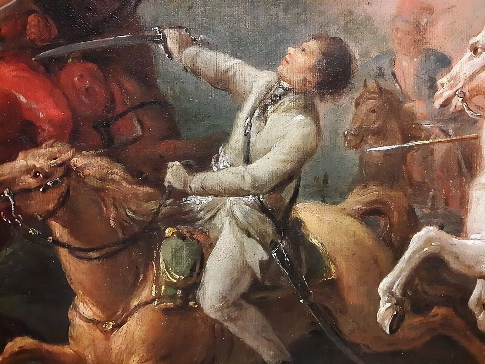 Kliknij, aby powiększyć Ilustracja przedstawia fragment obrazu ukazującego Tadeusza Kościuszkę jadącego na koniu. Jeździec odchyla się do tyłu. Wznosi w górę szablę, trzymaną w prawej dłoni. Pochwę do szabli ma przewieszoną przez prawe ramię munduru wojskowego bez epoletów. W tle widać innych jeźdźców na koniach.