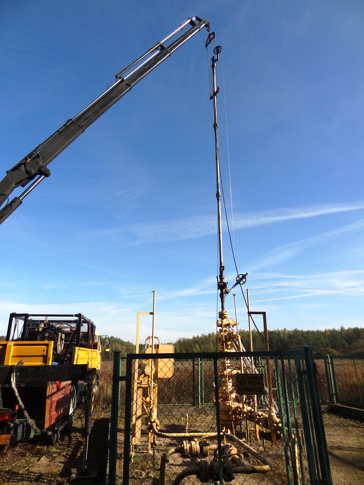 Głowica eksploatacyjna wyposażona w śluzę pomiarową.