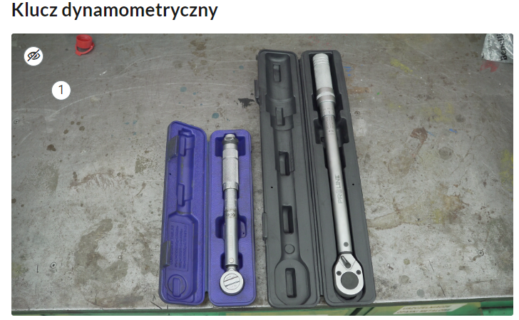 Przykładowy widok grafiki interaktywnej, na której znajduje się klikalny numerek do wyboru.