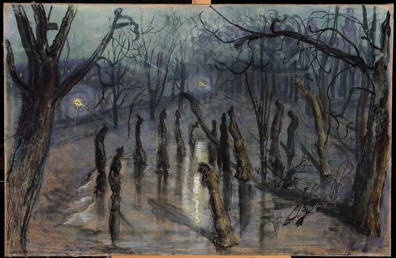 Ilustracja przedstawia nocny pejzaż. Umieszczono na nim liczne bezlistne drzewa. Pośrodku stoją w okręgu słomiane chochoły. W tle stoją zabudowania. Świecą latarnie.