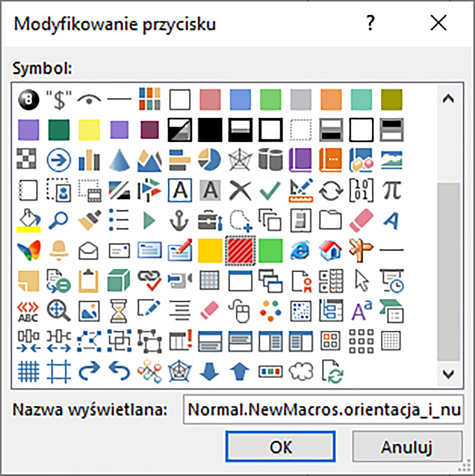 Zrzut ekranu przedstawia okno: Modyfikowanie przycisku.  Znajduje się w nim sekcja Symbol, która umożliwia wybranie symbolu dla przycisku.  Poniżej znajduje się pole Nazwa wyświetlana z  wpisaną nazwą makra.  Okno posiada takie przyciski jak Ok oraz anuluj.