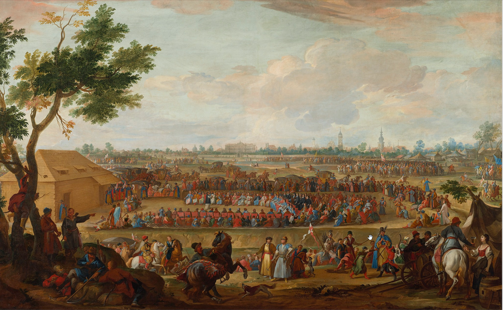  
Obraz przedstawia Sejm elekcyjny 1697 rok. Ogromny teren na środku pola a na nim zebranie setek osób. Na horyzoncie miasto, pas wież, drzew. 
