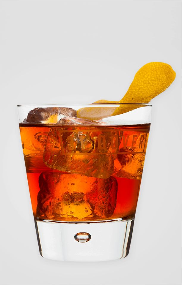 Zdjęcie przedstawia drink Rusty Nail. Pod punktami interaktywnymi znajdują się nagrania audio prezentujące opis każdego drinka.