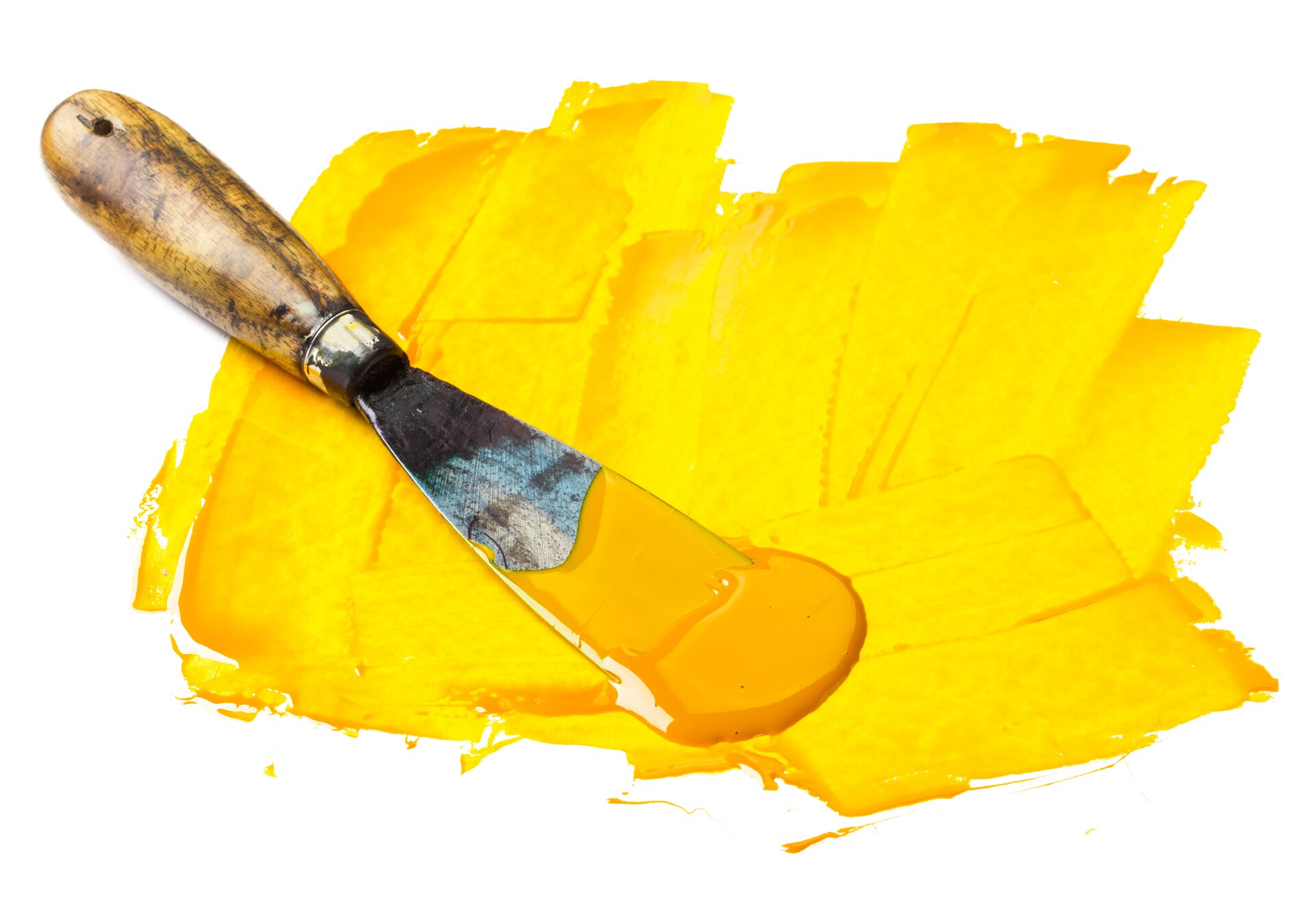 Ilustracja jest fotografią żółtej plamy barwnej,nakładanej szpachlą malarską. Gruba warstwa farby jest nakładana w różnych kierunkach.