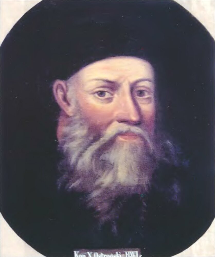 Na obrazie starszy mężczyzna z długą, siwą brodą i wąsami. Ma na głowie ciemne nakrycie.