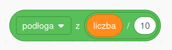 Zielony blok kodu z programu Scratch. Blok zawiera funkcję "podłoga" z wartości "liczba dzielone przez  10".