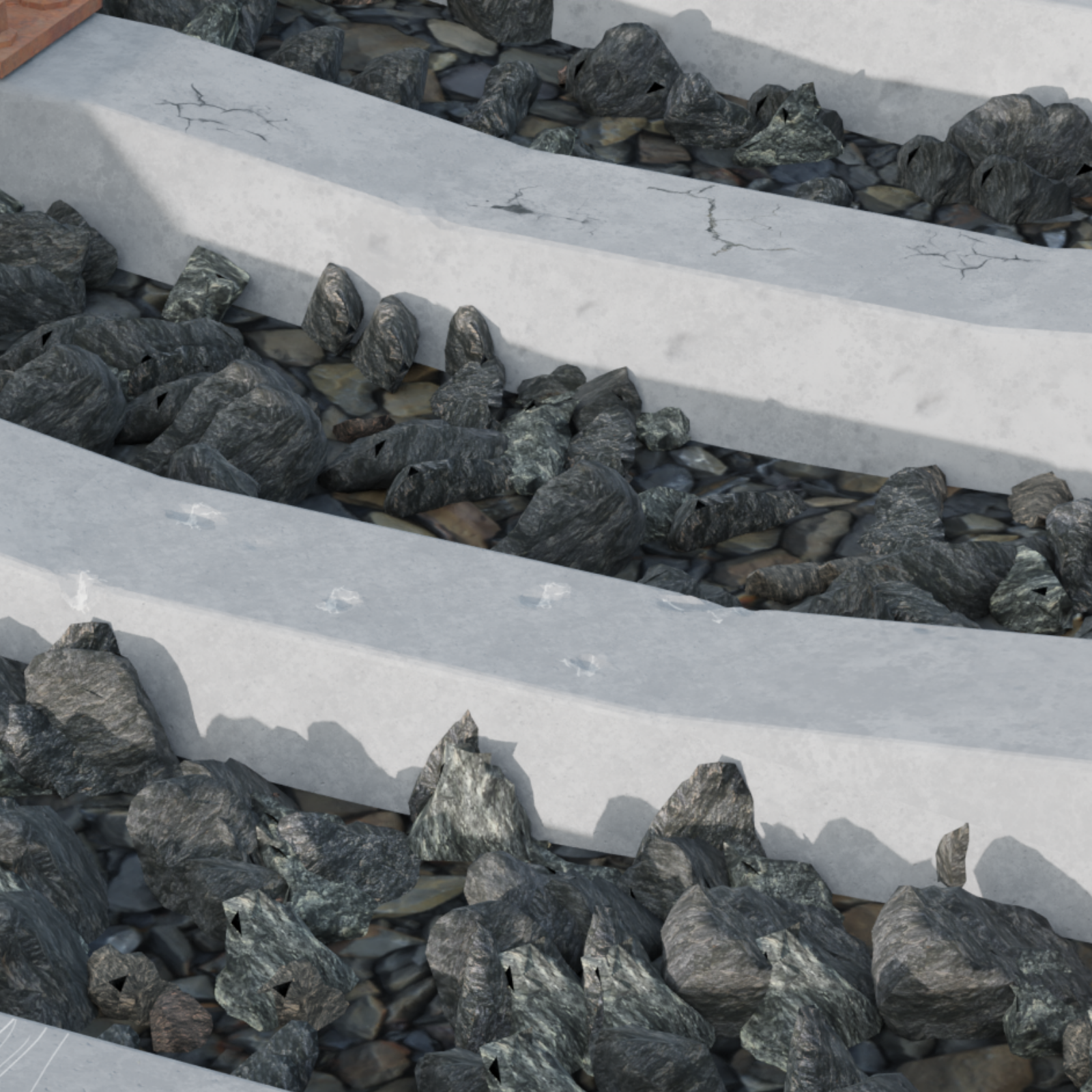 Ilustracja przedstawia tory kolejowe wraz z widocznymi betonowymi podkładami oraz kamieniami między nimi. Na podkładach widoczne są pęknięcia oraz odpryski.