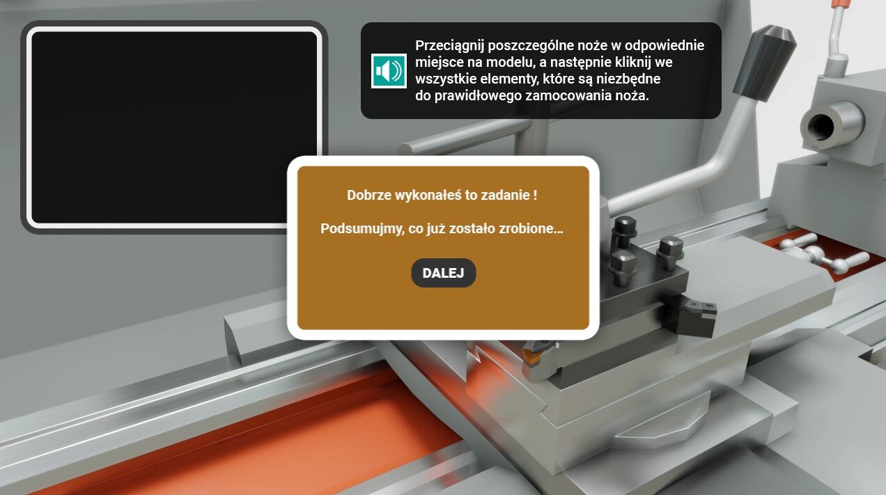 Ilustracja ukazuję ekran symulacji po  dobrym wykonaniu zadania. Znajduję się Fitbakiem z pozytywną informacją a pod nim czarny przycisk z napisem dalej.