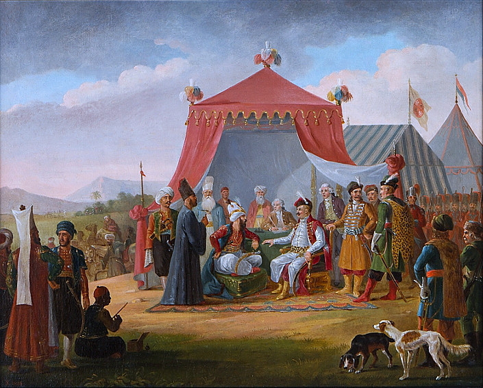 Ilustracja przedstawia dwóch mężczyzn siedzących przed otwartym namiotem. Oboje są elegancko ubrani, jeden z nich ma nakrycie głowy z piórem, drugi ma na głowie turban i siedzi po turecku. Rozmawiają ze sobą. Za nimi stoją doradcy. Dokoła inni ludzie przyglądają się. Widać dwa psy i dwa kolejne namioty.