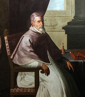 Obraz przedstawia papieża Urbana drugiego. Siedzi on przy stole. Jest ubrany w białe papieskie szaty. Ma krótką siwą brodę. Na stole leżą dwie książki o czerwonych okładkach oraz dzwoneczek.