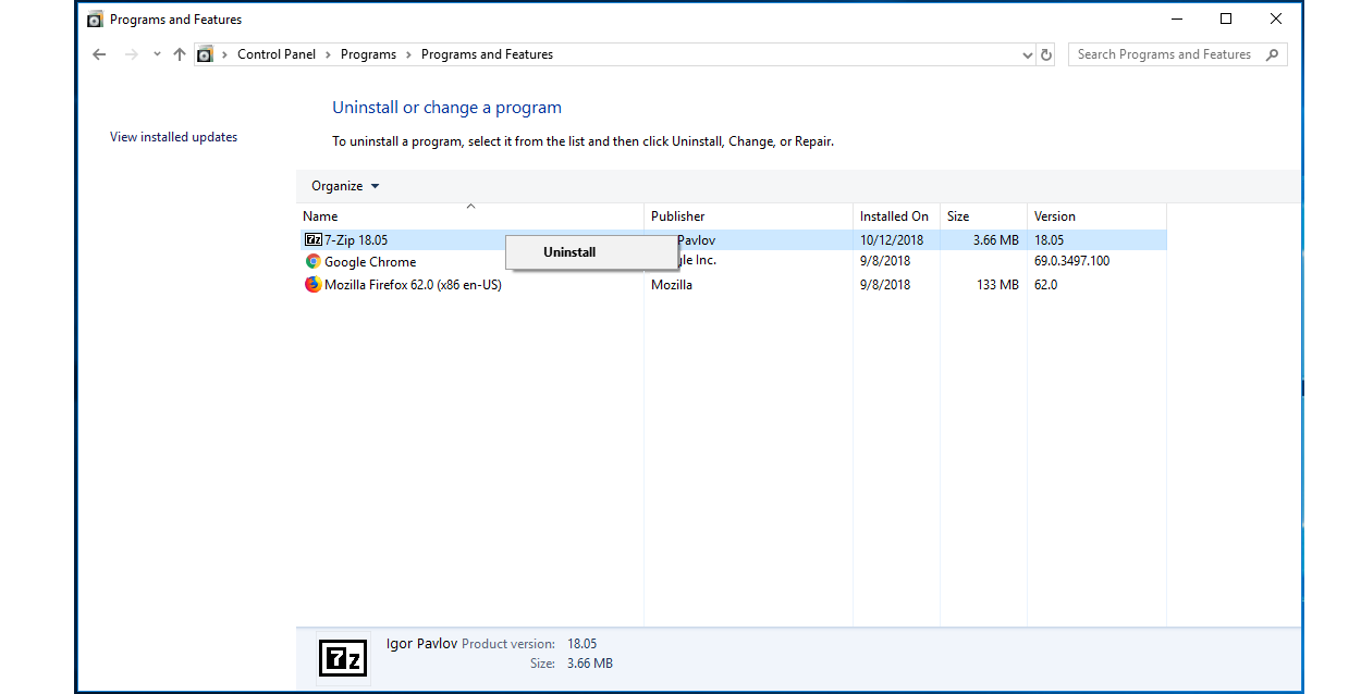 Zrzut ekranu przedstawia widok Panelu Sterowaniu. Na belce folderu napis Programs and Features. W oknie napis Uninstall or change a program.Okno podzielone na dwie części. Po lewej, węższej napis View installed updates. Po prawej napis: To uninstall a program, select it form the list and then click Uninstall, Change, or Repair. Poniżej tabela z nagłówkiem Organize oraz z kolumnami: Name, Publisher, Installed On, Size, Version. W tabeli przykładowe programy. Jeden z nich jest zaznaczony, do niego została wybrana opcja Uninstall.