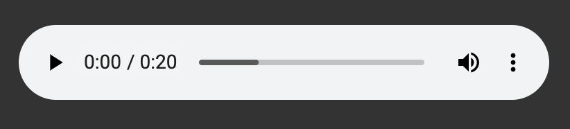 Grafika przedstawia panel odtwarzacza. Od lewej widoczna jest ikona włączenia odtwarzacza – ikona składa się z czarnego trójkąta. Wierzchołek trójkąta skierowany jest w prawo. Tło jest siwe. Następnie widoczny jest pasek z czasem nagrania – od lewej początek nagrania 00:00, następnie siwy krótki pasek, a po prawej czas całego nagrania – dwadzieścia sekund.Następnie widnieje ikona  zmiany głośności dźwięku w nagraniu. Składa się ona z ikony megafonu skierowanego w prawo, od którego odchodzą dwie półokrągłe linie symbolizujące fale dźwiękowe. Po prawej stronie megafonu znajduje się ikona w formie trzech pionowych kropek. Umożliwia ona wybór dwóch opcji: pobrania nagrania lub ustawienia szybkości odtwarzania nagrania.
