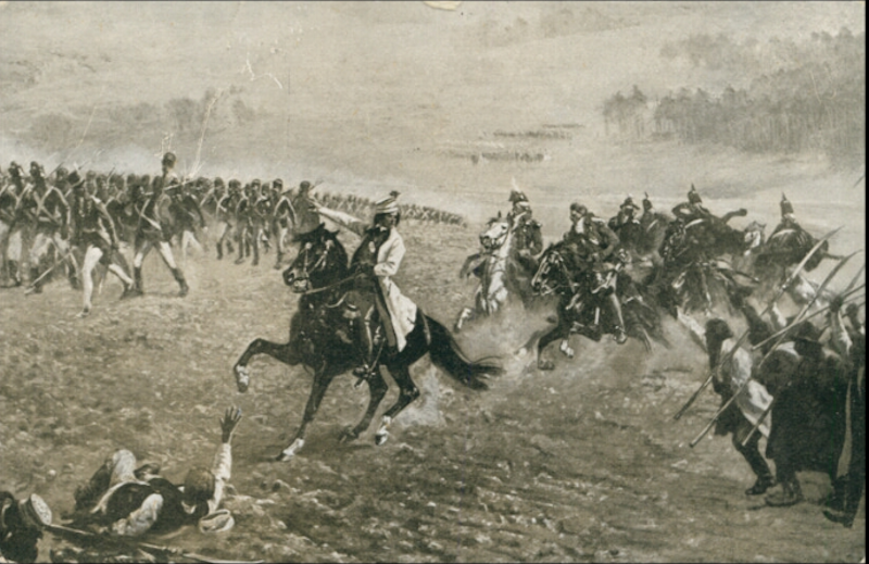 Ilustracja przedstawia Tadeusza Kościuszko w trackie Bitwy pod Racławicami. Konie w galopie, kurz spod kopyt. Armia z szablami na ramieniu. 