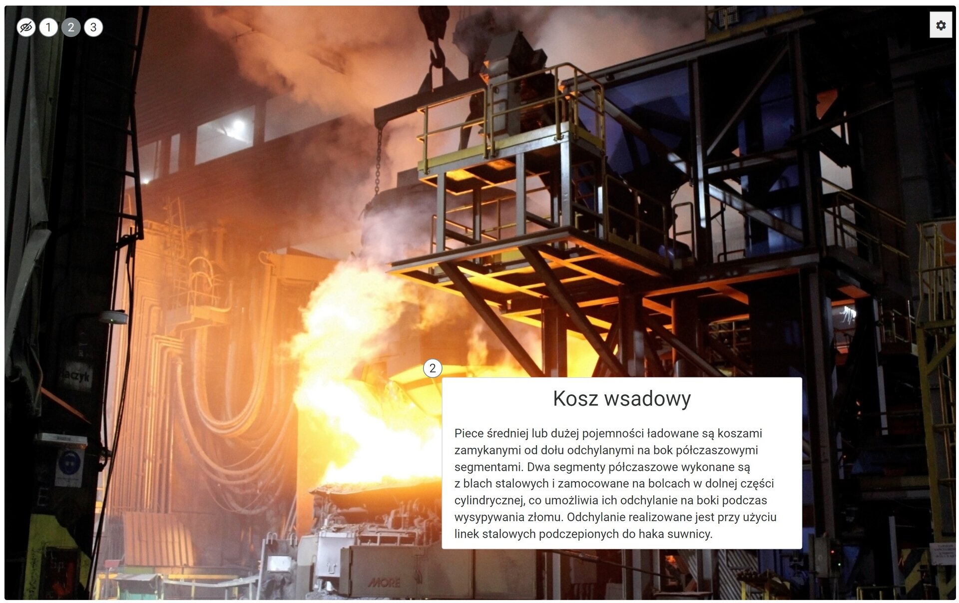 Przykładowy wygląd grafiki interaktywnej zawierającej zdjęcie i punkt interaktywny z opisem.