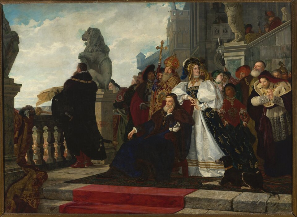 Ilustracja przedstawia obraz Henryka Rodakowskiego „Wojna kokosza”. Ukazuje scenę zbiorową na tle pejzażu. Na tarasie siedzi król w towarzystwie dworzan. Lewą rękę trzyma na brodzie, jest zamyślony. Ma na sobie długi płaszcz z futrzanym wykończeniem. Za nim stoi grupa osób, wśród nich po lewej wyróżnia się biskup z pastorałem i infułą. Po lewej stronie, przy balustradzie stoi odwrócony tyłem mężczyzna i trzyma w rękach arkusz papieru. Wpatruje się w dal. Tło prawej strony wypełnia fasada zamku, a z lewej znajduje się widoczna z góry zabudowa miasta i pogodne niebo z białymi obłokami.  